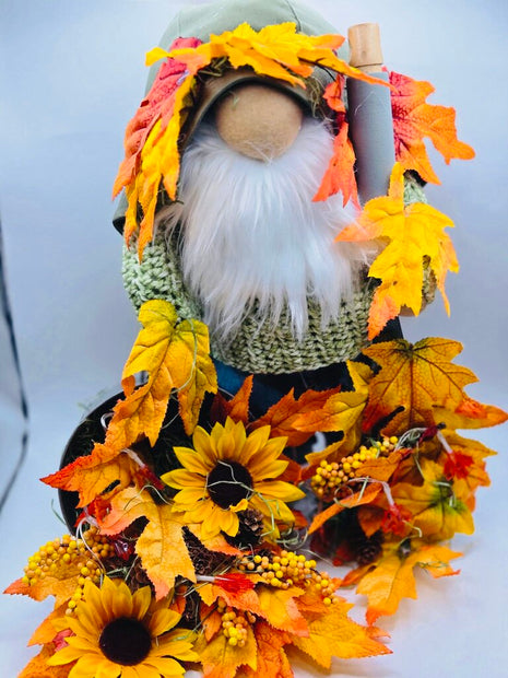 Big Gnome Raking Fall leaves