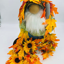 Big Gnome Raking Fall leaves - view 2