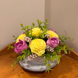 Tea Cup filled with Pink and Yellow Sola Wood Flowers - view 1