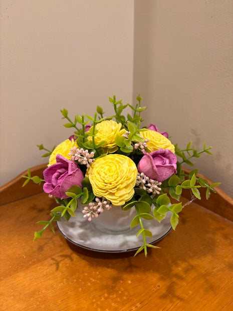 Tea Cup filled with Pink and Yellow Sola Wood Flowers