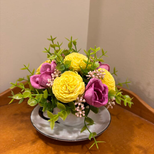 Tea Cup filled with Pink and Yellow Sola Wood Flowers