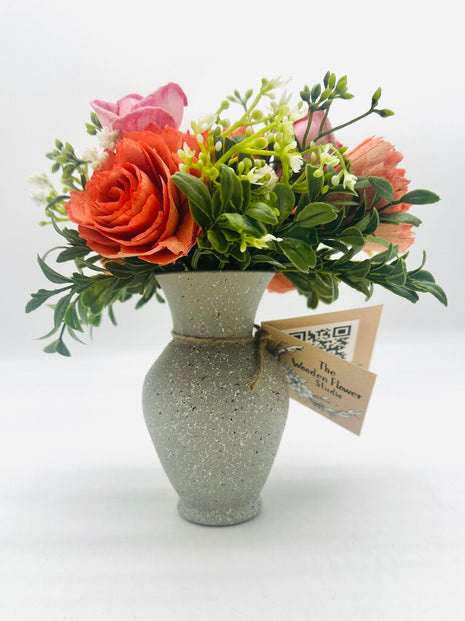 Gray Vase filled with Sola Wood Flowers