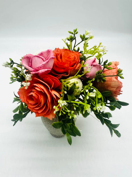 Gray Vase filled with Sola Wood Flowers