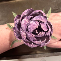 Wrist Corsage with a Purple Sola Wood Flower on a pearl bracelet - view 1