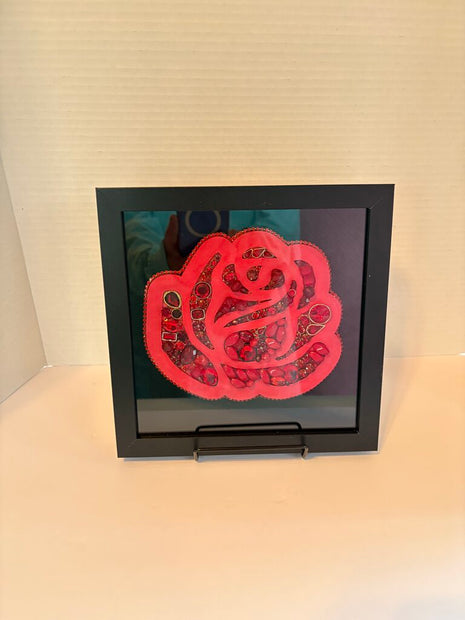 RED ROSE in 8x8 black sb painted and filled in w/red rhinestone jewelry