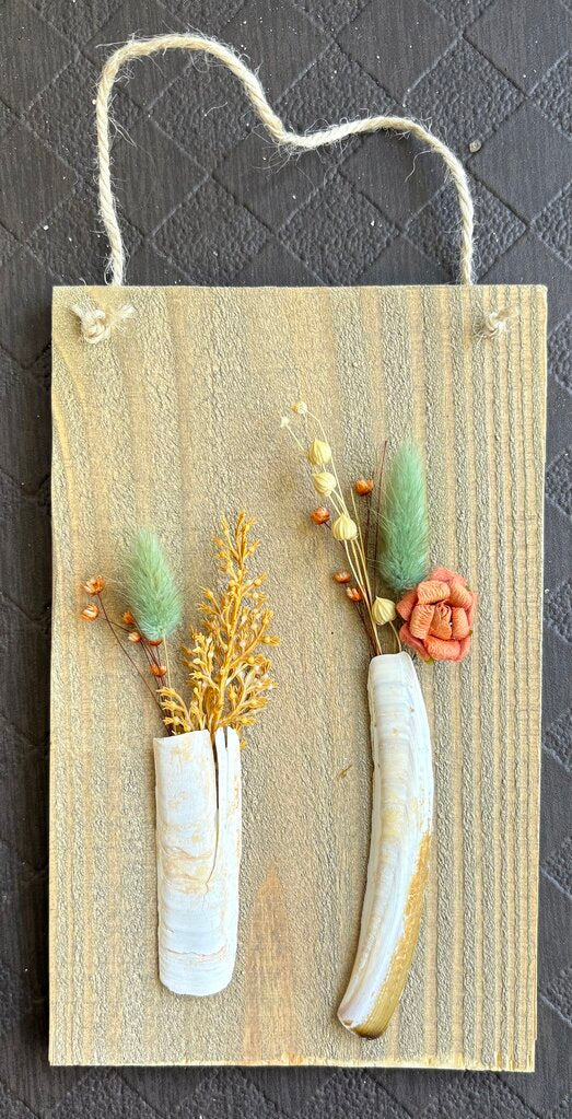Wood with shells snd green flowers