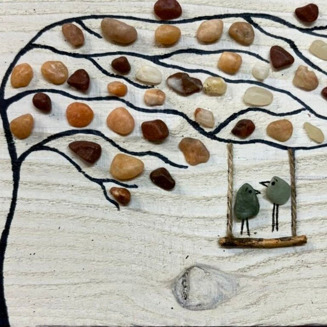 Swaying tree with stones, green Birds on swing