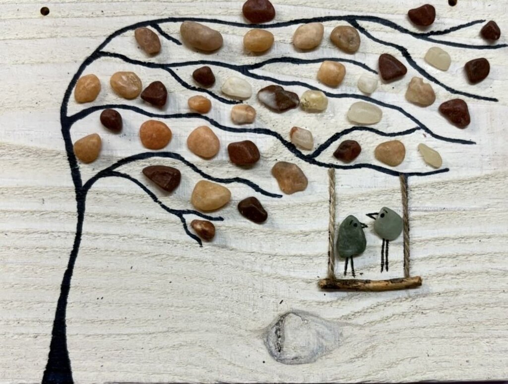Swaying tree with stones, green Birds on swing