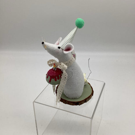 Birthday Mouse holding green cake with candle
