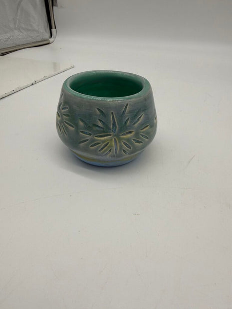 Blue carved votive holder