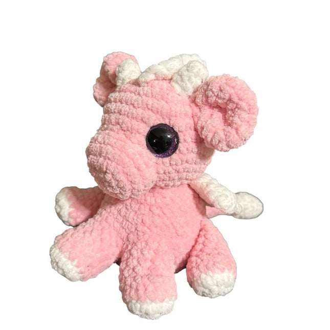 Crocheted small baby dragon sitting plush
