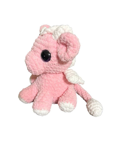 Crocheted small baby dragon sitting plush