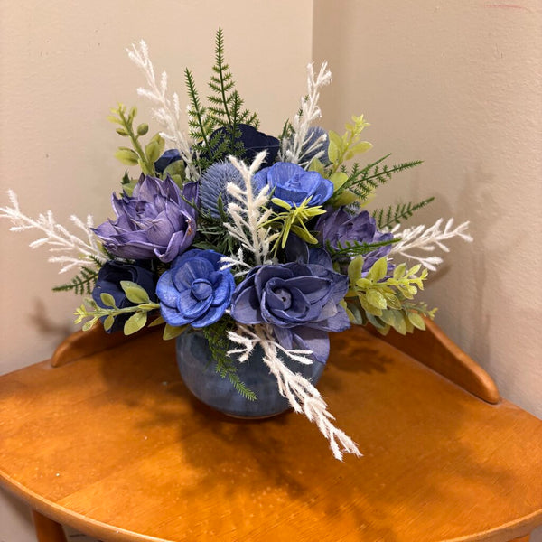 Blue Cup filled with Blue and Purple Sola Wood Flowers