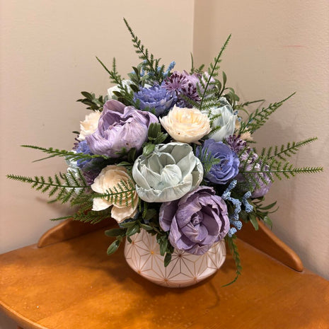White and Gold Vase filled with Blue, Purple and Green Sola Wood Flowers