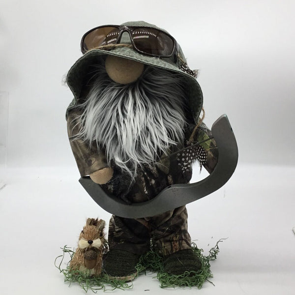 Big hunting gnome with bow and chipmunk