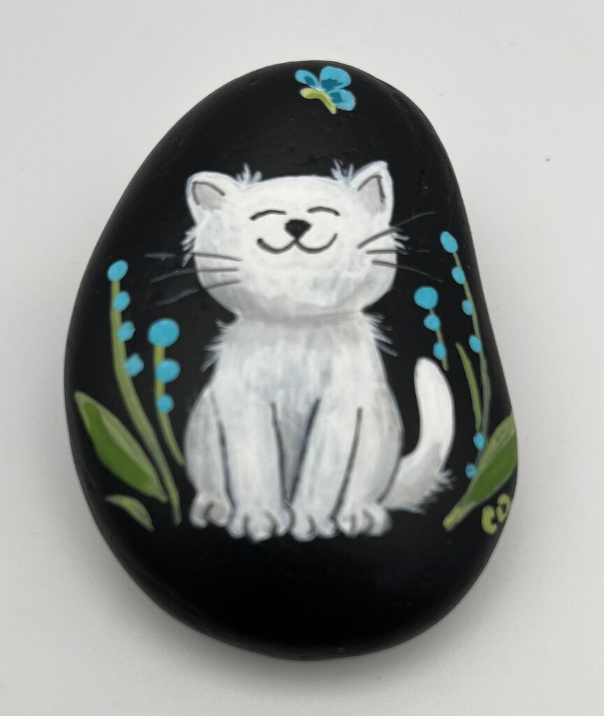 Rock large black w/white cat