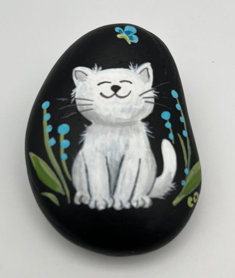 Rock large black w/white cat