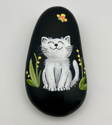Rock large black w/white cat