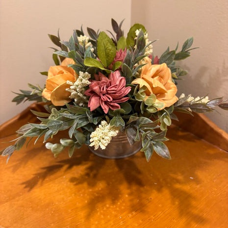 Low Tin filled with Yellow and Rust colored Sola Wood Flowers