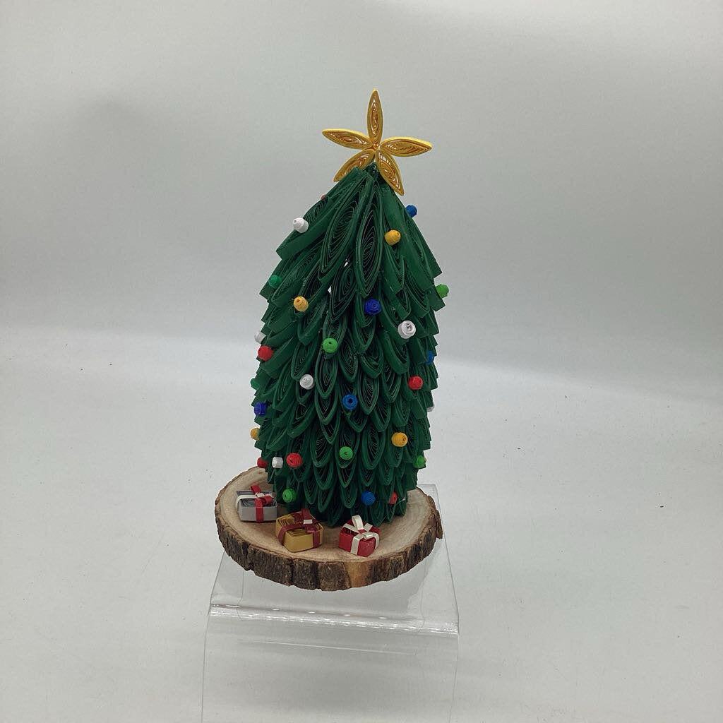 Christmas Tree with presents on a wooden floor