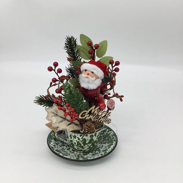 Santa in Green Enamel Cup and Saucer