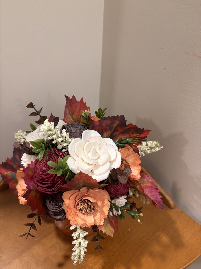 Pumpkin Mug filled with Sola Wood Flowers