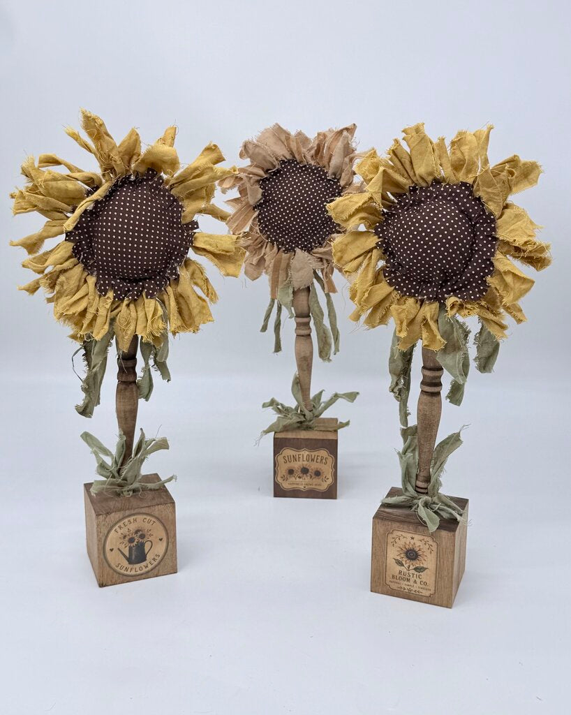 Sunflower on wood block