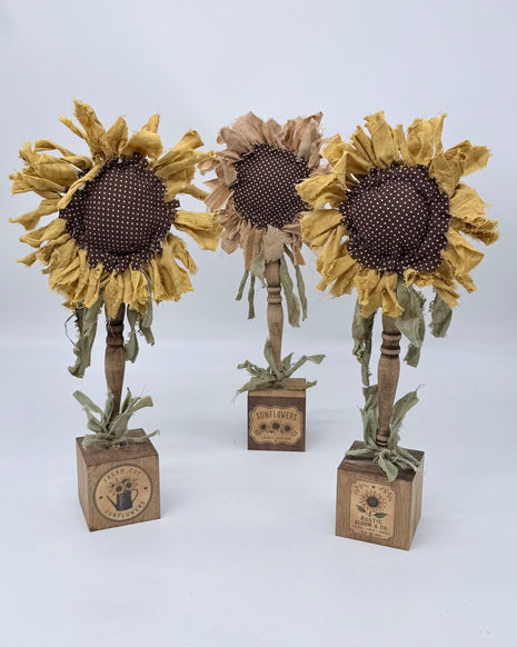 Sunflower on wood block