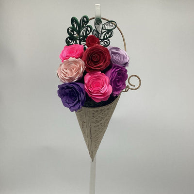 Multi colored roses in hanging vase