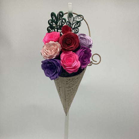 Multi colored roses in hanging vase