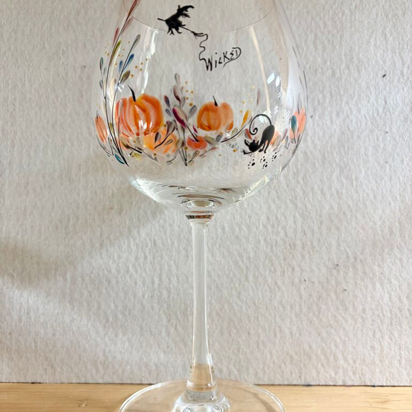 Pumpkins wine with witch