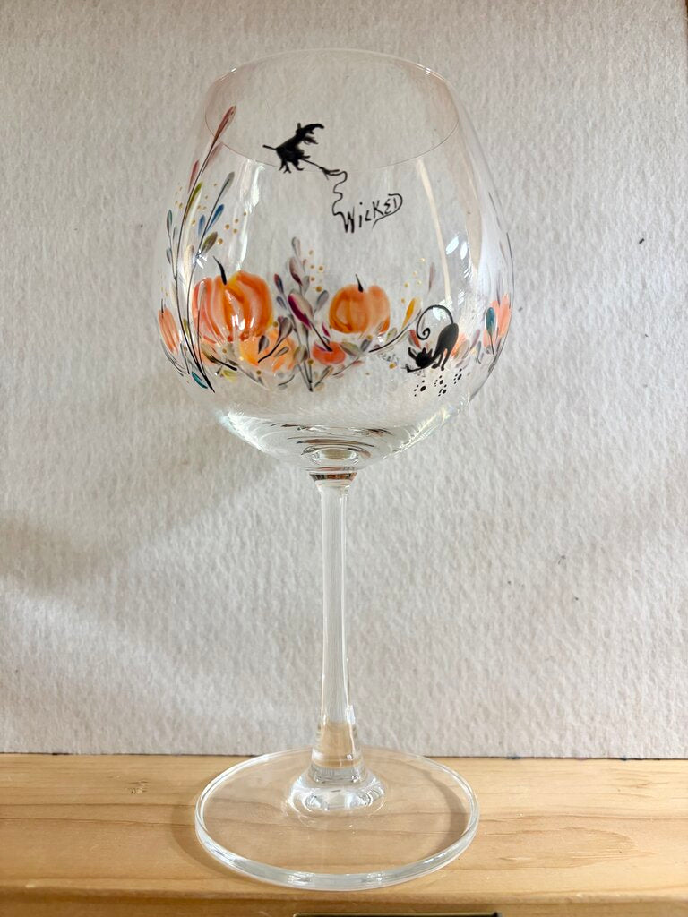 Pumpkins wine with witch