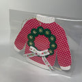 Stitched sweater gift tag