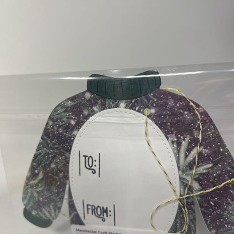 Stitched sweater gift tag