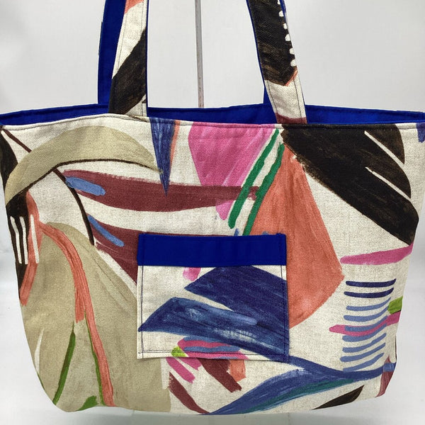 Multi colored leaf w/ blue reversible tote bag