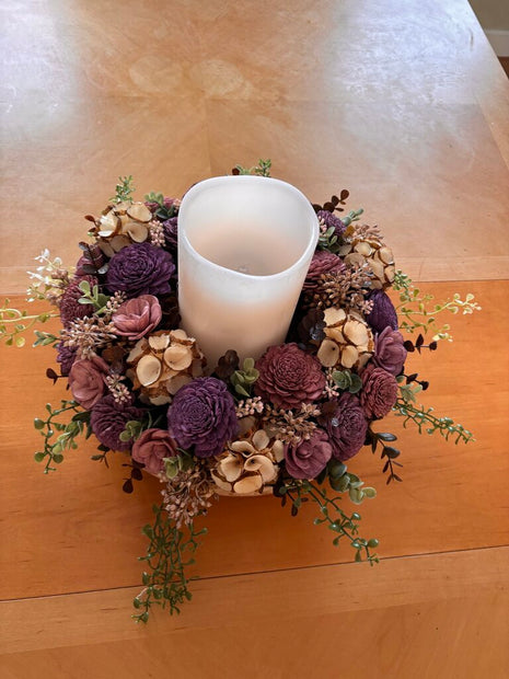 Large Wooden Bowl filled with Purple, Cream and Brown Sola Wood Flowers and Center Candle