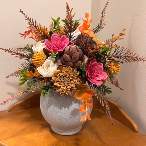 Round Vase filled with Pink, Yellow and Brown Sola Wood Flowers
