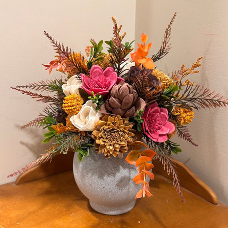 Round Vase filled with Pink, Yellow and Brown Sola Wood Flowers