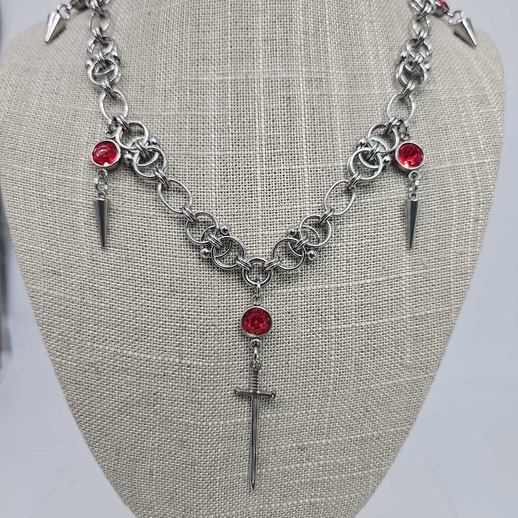 Stainless Steel Beaded Helm And Red Crystal and Spikes with Sword Necklace 16-18 inches long