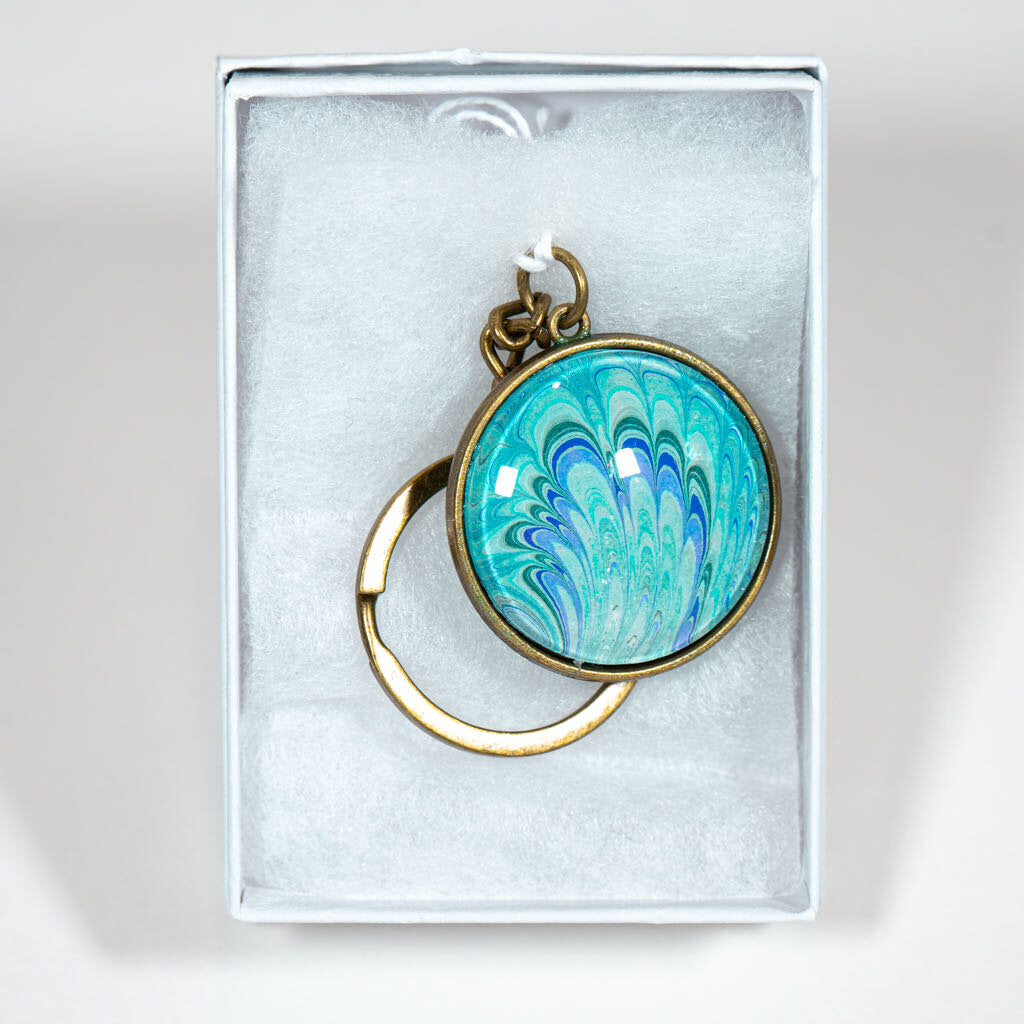 1.25" Round Keychain - Gift Box - Green purple