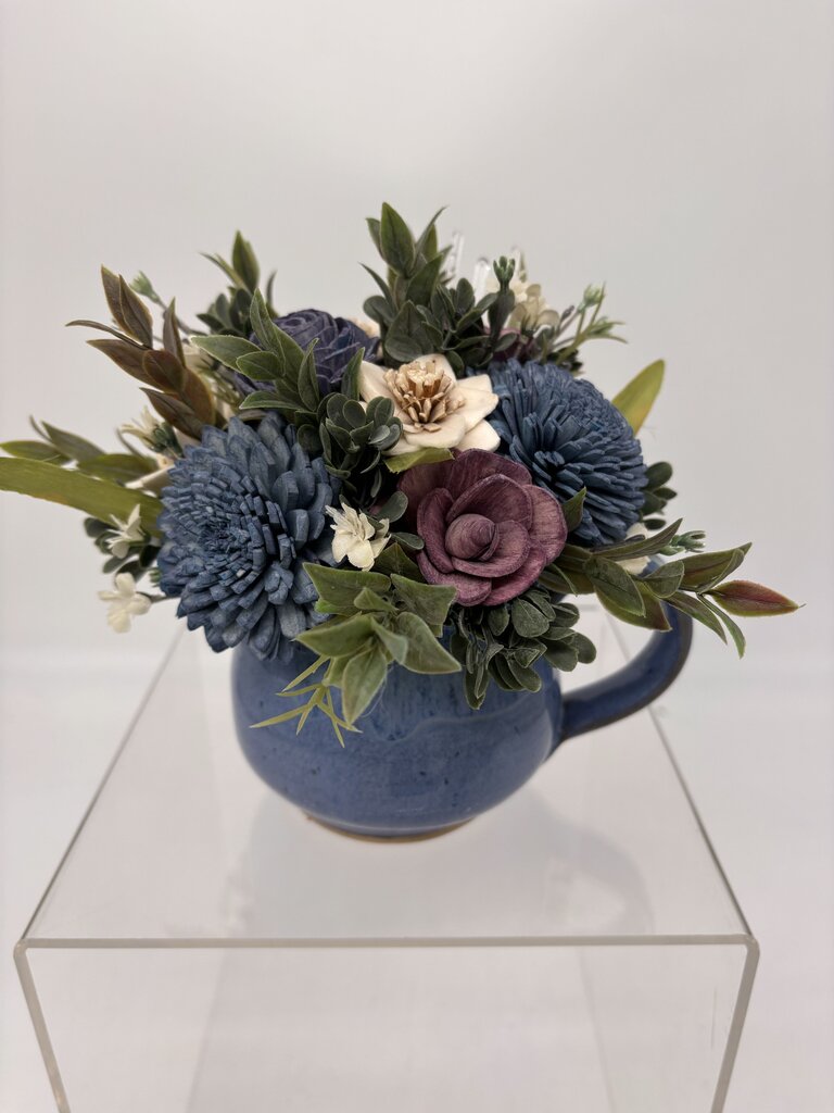 Blue Cup filled with Blue, Purple and White Sola Wood Flowers