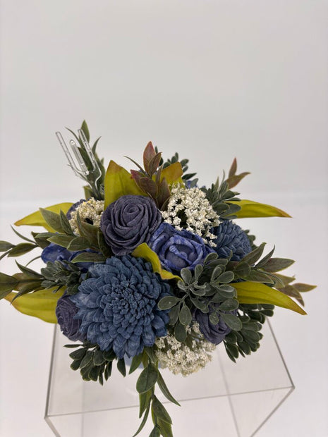 Blue Cup filled with Blue Sola Wood Flowers and White Accents