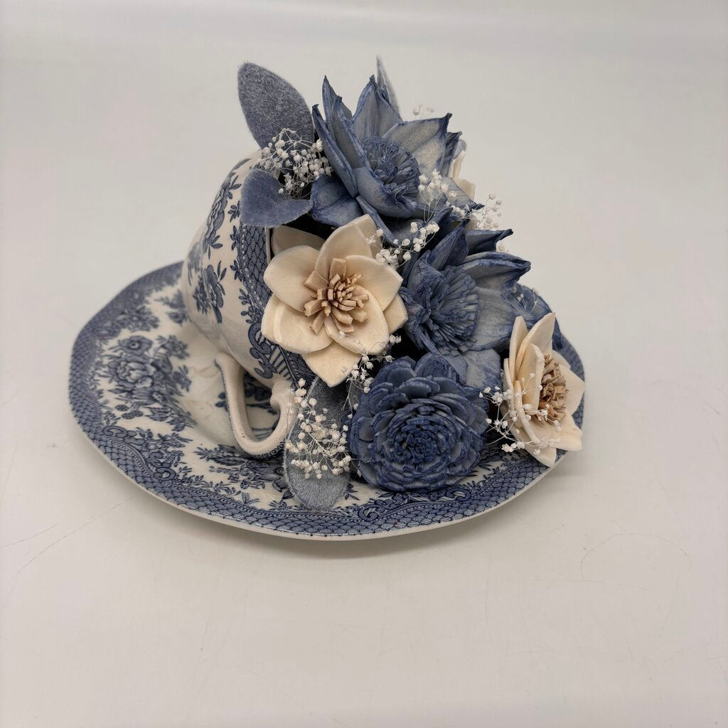 Tipped Tea Cup with Light Blue and White Sola Wood Flowers
