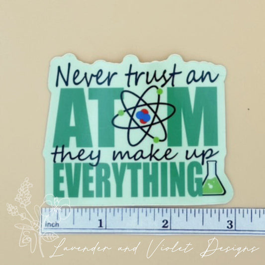 NEVER TRUST AN ATOM VINYL STICKER